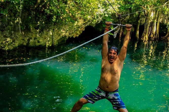3 adrenaline activities Atvs Zipline and a swim experience in a cenote - Ziplining above the jungle floor