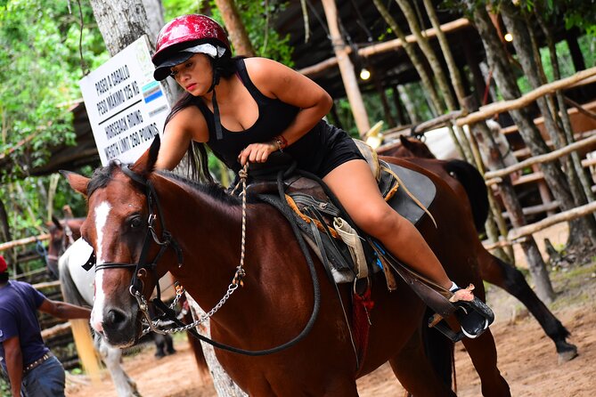 4 activities in 1 Horse Riding, ATV Shared, Cenote & Ziplines from Cancún - Swimming in a freshwater cenote