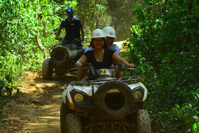 Action-packed Cancun ATV tour, Ziplines, Cenote, Lunch and More - ATV riding through the Mayan jungle