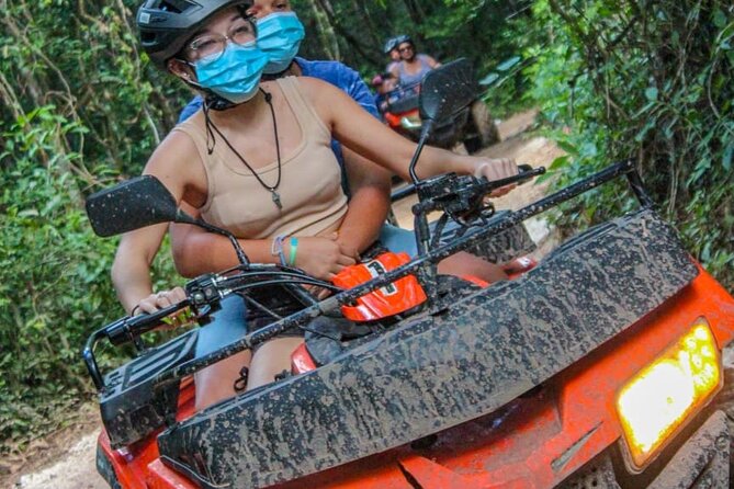 Adrenaline Tour with ATV, Ziplines and Cenote from Cancun - Swimming in a real cenote