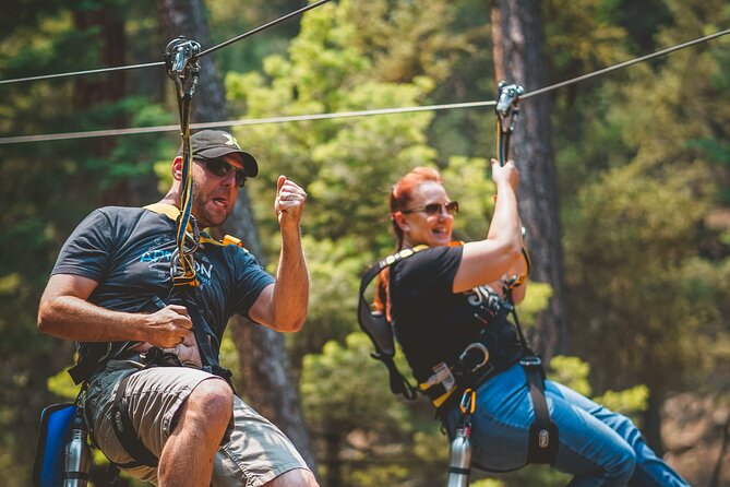 All-Day Guided Zipline Tour with Train Ride and Lunch in Durango - Riding the red Tall Timber train