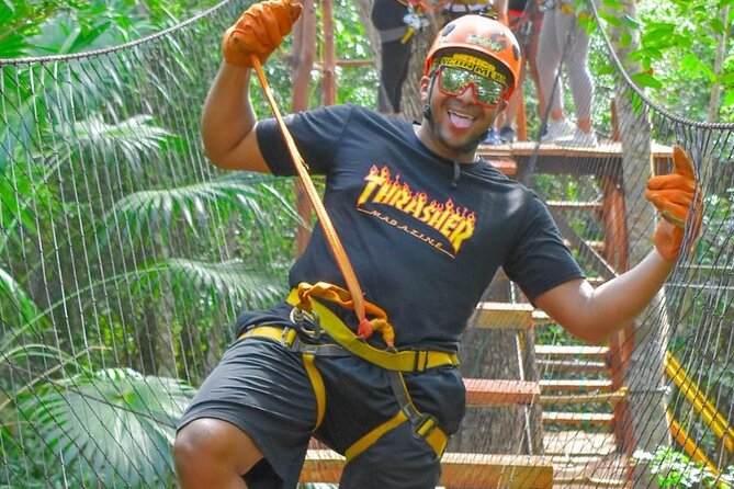 Amazing ATV Tour, Ziplines and Cenote Swim with Lunch and round trip included - Zip lines through the treetops