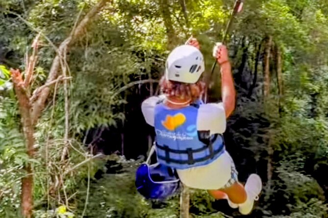 AMBER COVE-TAINO BAY 5 Zip Lines 7 Waterfalls + Locale Food - Flying over the forest before the waterfalls