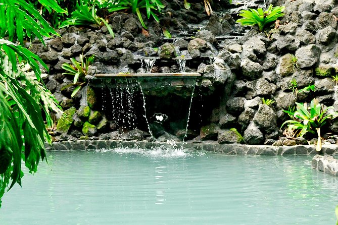 Arenal Volcano Combination Tour: Zipline, Tubing and Hot Springs - Tubing through Arenal River rapids