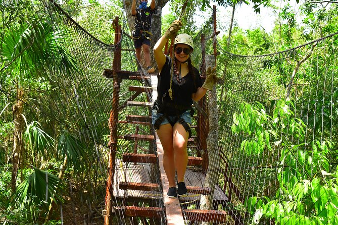 ATV adventure with cenote, ziplines, snack and transport from Cancun or Riviera - Ziplines above the jungle floor