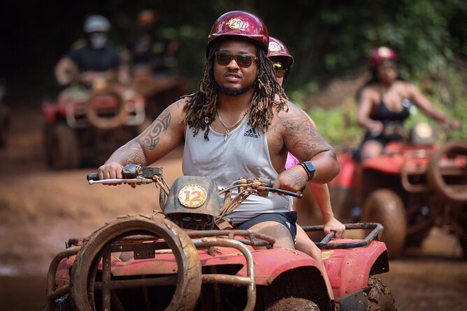 ATV adventure with cenote, ziplines, snack and transport from Cancun or Riviera - ATV riding through the jungle