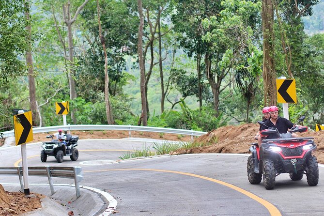ATV And Zipline Experience on Koh Samui with Transfer - Ziplining above the jungle