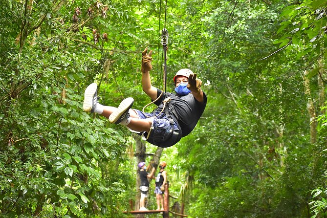 ATV Combo Horseback Riding, ATV, Ziplines, Cenote and Lunch - ATV riding on a rough jungle course