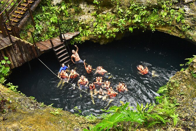 ATV, Ziplines, Tarzan Jump, Lunch and Transportation Day Tour - The cenote and Tarzan swing finish
