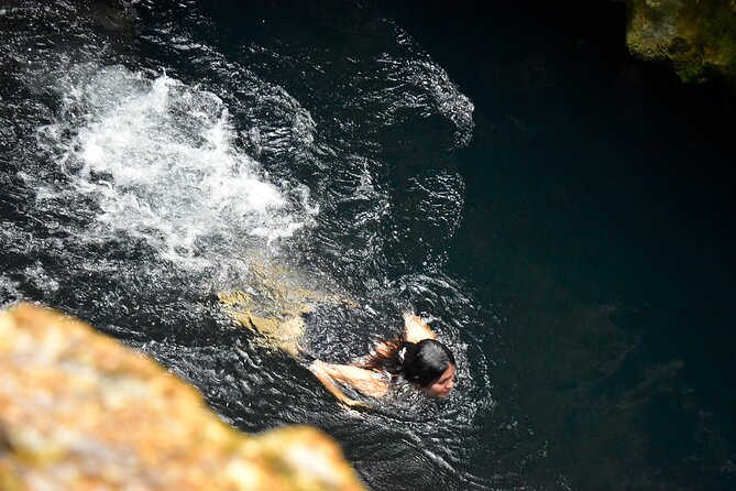 Awesome ATV experience in the jungle with cenote swim and ziplines included - Swimming in the sacred cenote