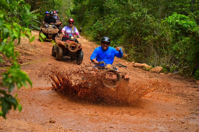Awesome ATV experience in the jungle with cenote swim and ziplines included - Riding the ATV through the Mayan jungle