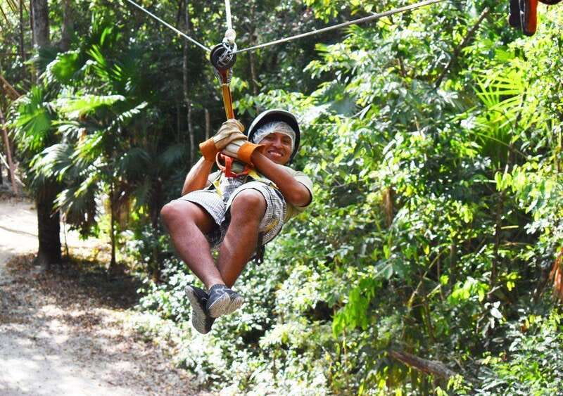 Cancun: Amazing Horseback Riding Tour, Cenote, Zipline & ATV - Ziplining above the tree canopy