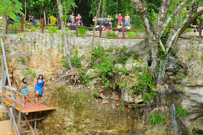 Cancun ATV Tour with Zipline, Cenote & Transportation - Three ziplines above the jungle floor