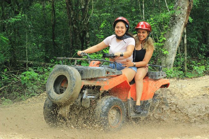 Cancun Jungle Adventure ATVs, Ziplines & Cenote Swim - ATV riding on muddy jungle paths
