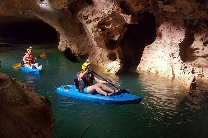 Cave Kayaking & Ziplines, V.i.V. - Paddling beneath the limestone