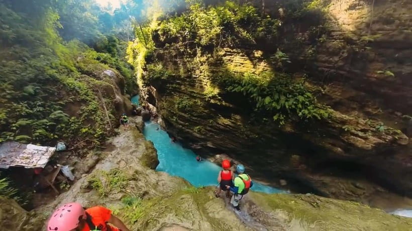Cebu: Kawasan Falls Canyoneering Tour with Ziplining & Lunch - Entering Kawasan Falls by foot, swim, and jump