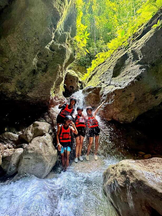 Cebu: Shared Tour Kawasan Falls Canyoneering & Ziplining - Reaching the turquoise water at Kawasan Falls