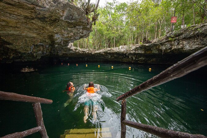Cenote Tankah and Mayan Village Tour with Zipline, Canoes & Lunch - Swimming in Tankah’s clear cenotes