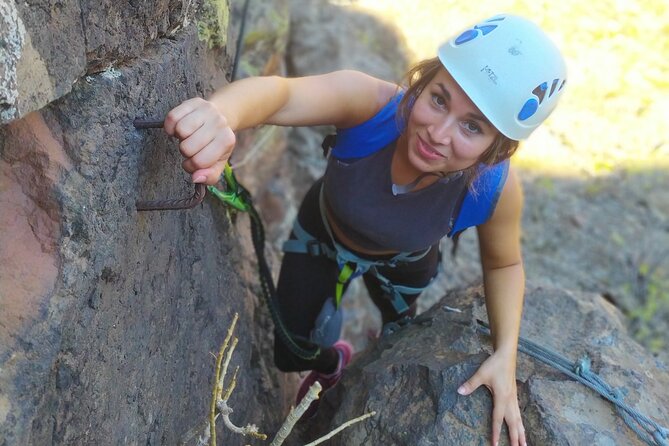Climbing + Zipline + Via Ferrata + Cave. Adventure route in Gran Canaria - Entering a volcanic tube by headlamp