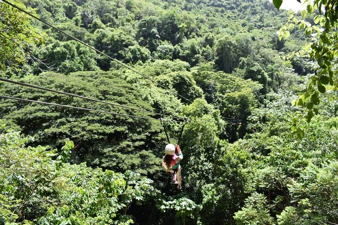 Damajagua Waterfalls, Zipline with Lunch and Transfer - Sliding, jumping, and swimming through the falls