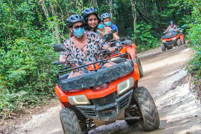 Drive an Atv shared, swim in a Cenote and ziplines in the Cancun - Food, photos, and the extras that change the price