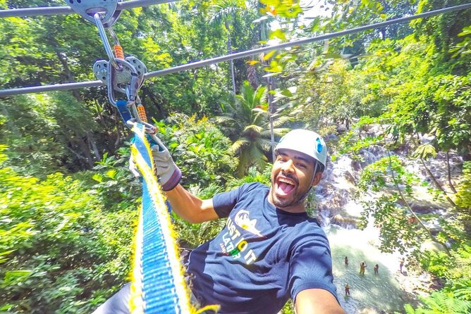 Dunn's River Falls and Park Tour with Zip Line from Montego Bay - A zip line above the Jamaican rainforest