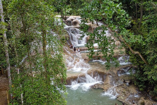 Dunns River Falls, Rafting, Zipline & Horseback from Montego Bay - Scotchies Drax Hall for jerk chicken and Red Stripe