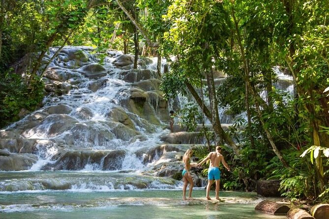 Dunns River Falls, Zipline, Bamboo Rafting, Horseback Ride Tour - Horseback riding from land into the sea