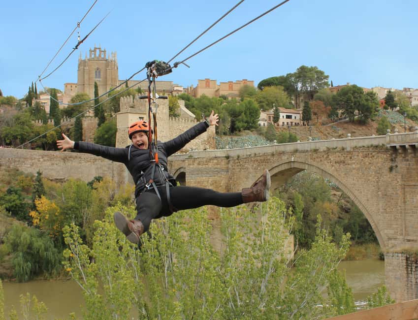 Fly Over Toledo: Urban Zipline over Tagus River - Arriving at the FLY TOLEDO vintage red van