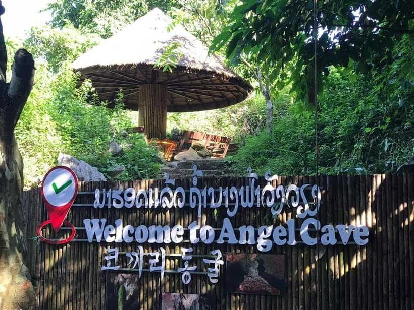 From Vientiane: Vang Vieng Tour with Cave Kayak & Zipline - Wat Kang gives the return route some cultural depth