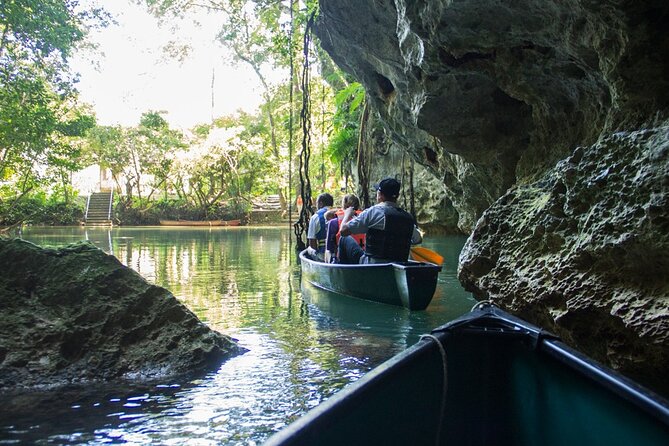 Half-Day Barton Creek Cave with Optional Zipline, Butterfly Farm Or Rock Falls - Entering Barton Creek Cave by open canoe