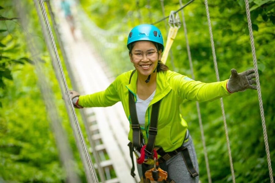 Henderson, Minnesota: 14-Line Zipline Canopy Tour - Crossing the 170-foot suspension bridge