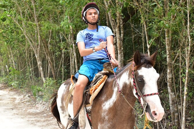 Horseback Ride, ATV's (Shared), Ziplines & Cenote Swim! From Cancun & Riviera - Ziplining above the jungle