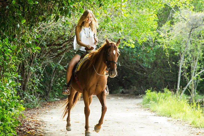 Horseback Riding + ATV + Cenote + Zip-Line from Cancun and Playa del Carmen - Horseback riding through the ranch