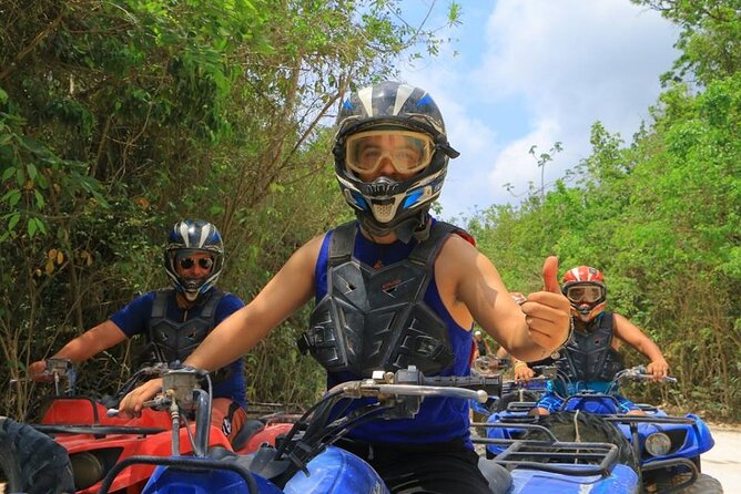 Jungle Adventure from Cancun: ATVs, ziplines, cenote and fun! - Ziplining above the trees