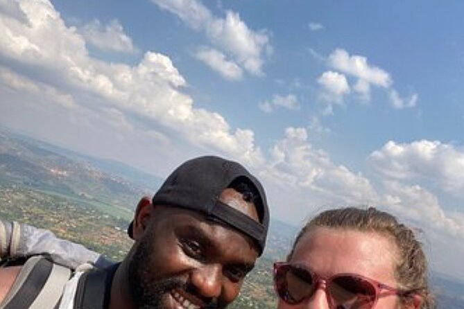 Mount Kigali Hike and Zipline Adventure Tour(Pick up &drop off) - The summit: city views on one side, countryside on the other