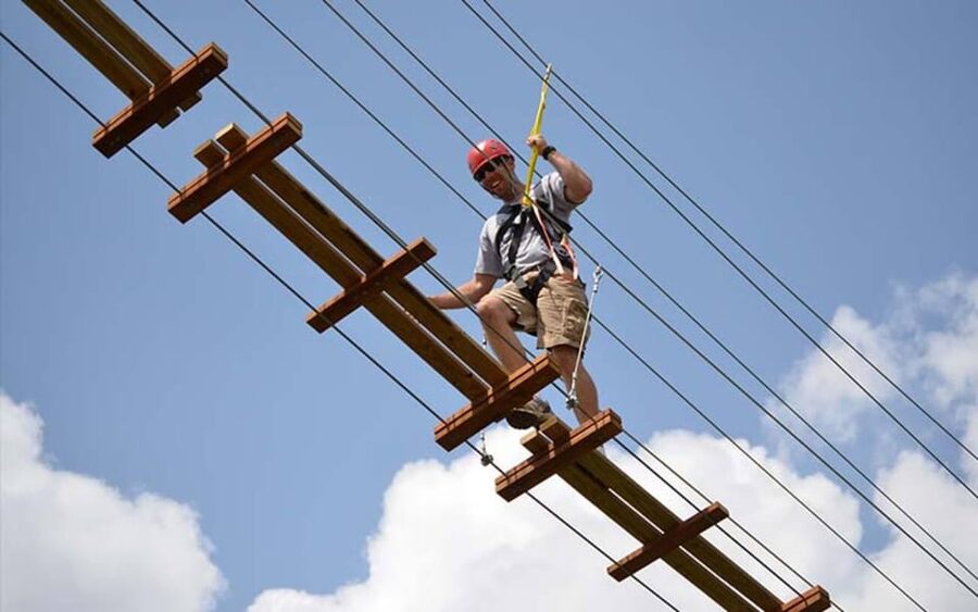 Orlando: Gatorland Zipline Adventure w/ Full-Day Park Access - Crossing the swinging bridge