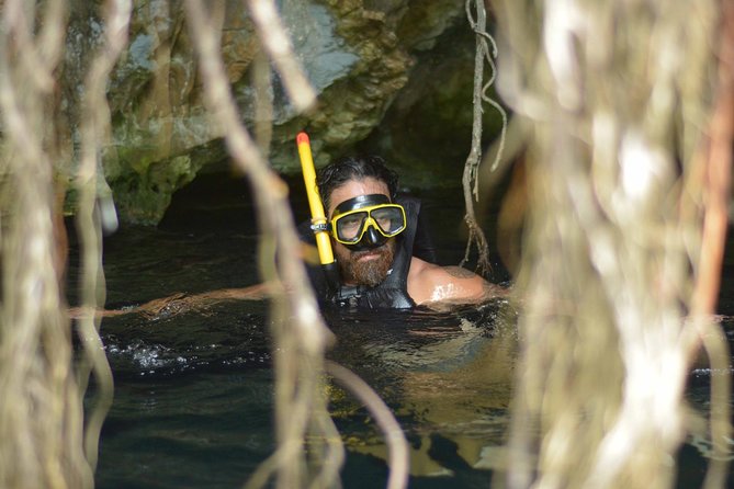 Playa del Carmen Jungle Tour: Tulum, Cenote Snorkeling, Ziplining and Lunch - Cenote snorkeling in cool, dark water