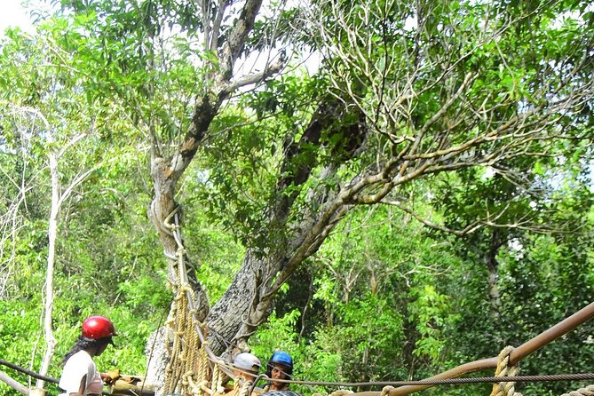 Playa del Carmen Maya Adrenaline Day ATV Zipline and Cenote - Cooling off in an artificial cenote