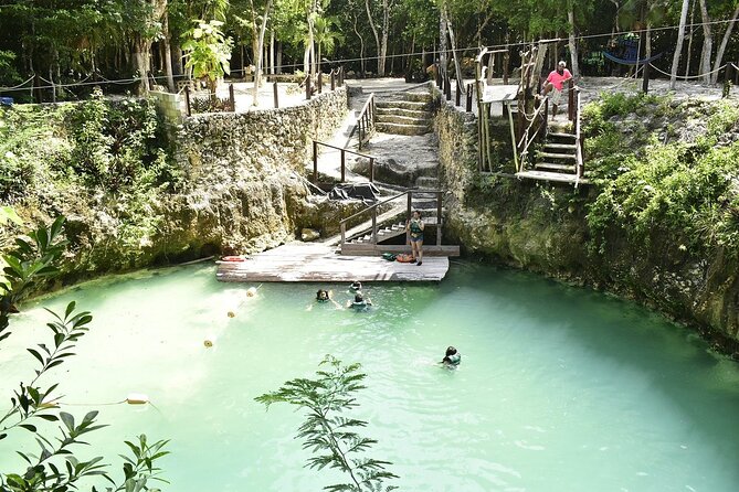 Playa del Carmen Maya Adrenaline Day ATV Zipline and Cenote - ATV riding on rugged jungle trails