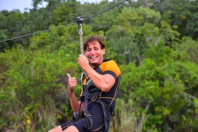 Private Coba & Jungle Adventure: Zipline, Rappel & Cenote - Cobá by bike, with ruins rising from the forest