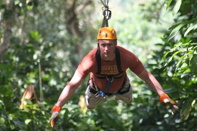 Punta cana: Half-Day Zipline Tour - Safety equipment and the flying position