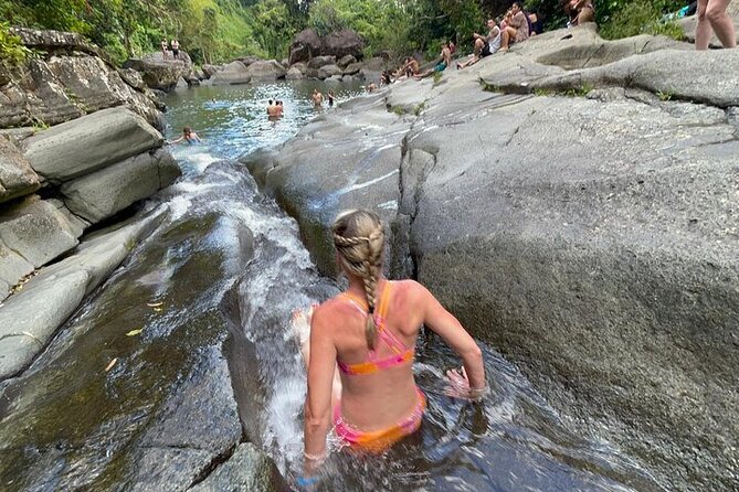 Rainforest Zipline, Luquillo Beach, and Natural Springs Day Trip - Natural Springs and Rock Slides in the El Yunque Area