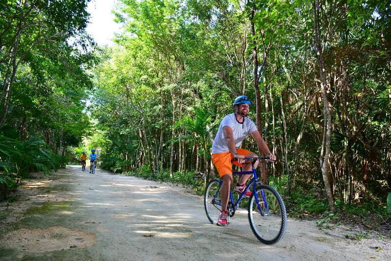 Rio Secreto Nature Reserve: Bicycle, Rappel & Ziplines Tour - What happens from pickup to the visitor center