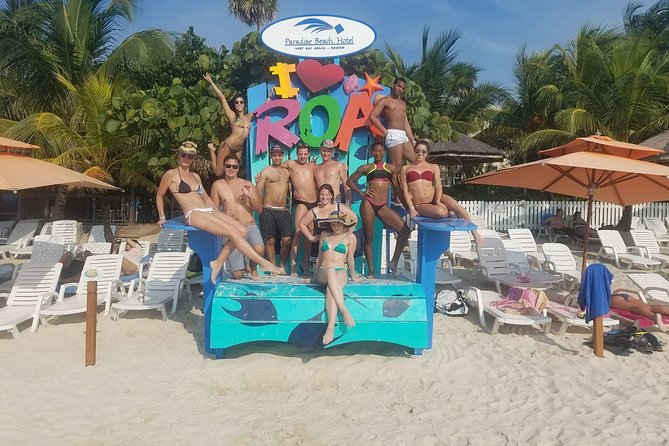 Roatan Canopy Zip Line and Beach Escape - The guides make the first jump easier