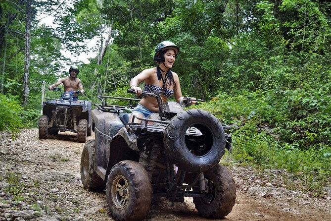 Shared ATV, Zipline, and Cenote Adventure from Playa del Carmen - Flying through the trees on the zipline circuit