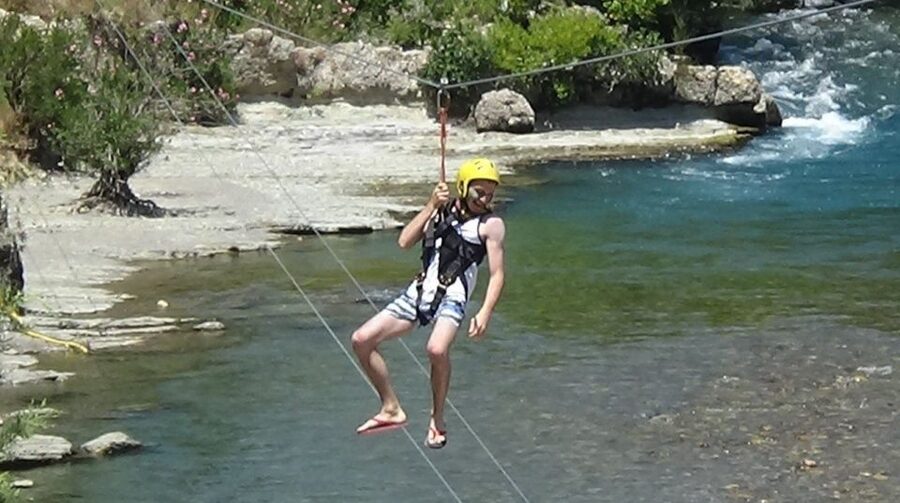 Side: Rafting and Zipline Canyon Tour with Lunch & Transfers - The 15-minute open-top tour and Roman bridge