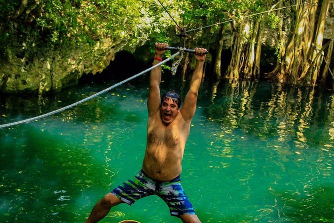 The best adrenaline day Atvs shared, ziplines and cenote Playa del Carmen - Ziplining with a guide who keeps things lively