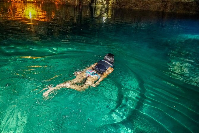 The Best Adrenaline Park! ATV´s Ziplines & Cenote swim experience from Cancun - Ziplining above the trees