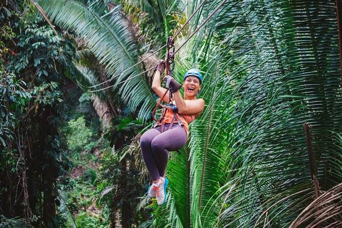 Thrilling Zipline Adventure at Bocawina Rainforest - Getting fitted with triple safety gear